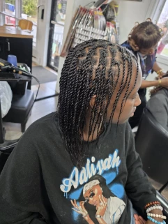 Portrait — Soins Cheveux Naturels